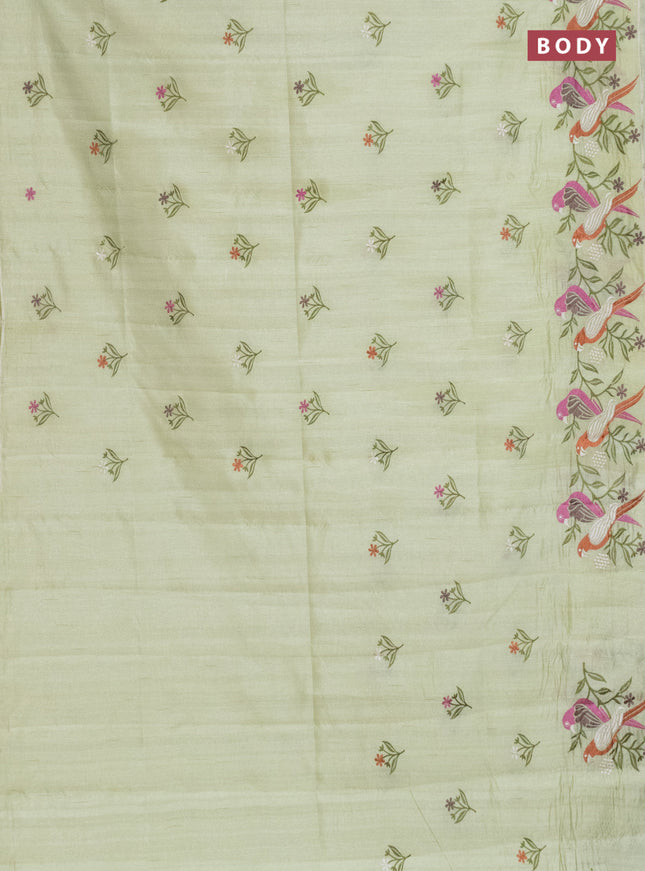 Semi raw silk saree pista green with embroidery work buttas and parrot design embroidery butta border