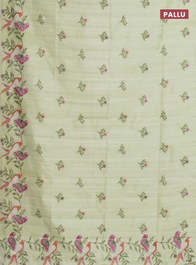 Semi raw silk saree pista green with embroidery work buttas and parrot design embroidery butta border