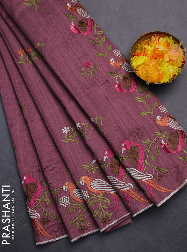 Semi raw silk saree pastel purple shade with embroidery work buttas and parrot design embroidery butta border