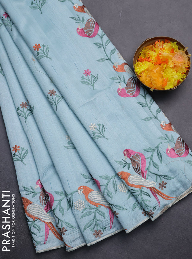 Semi raw silk saree pastel blue with embroidery work buttas and parrot design embroidery butta border