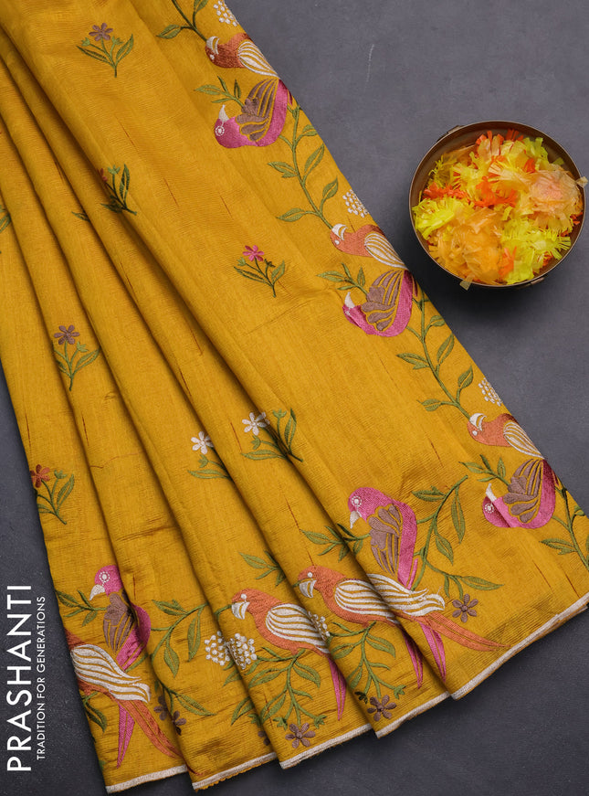 Semi raw silk saree mustard yellow with embroidery work buttas and parrot design embroidery butta border