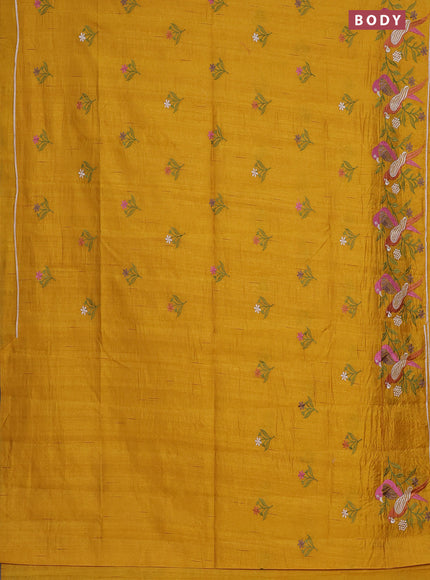 Semi raw silk saree mustard yellow with embroidery work buttas and parrot design embroidery butta border
