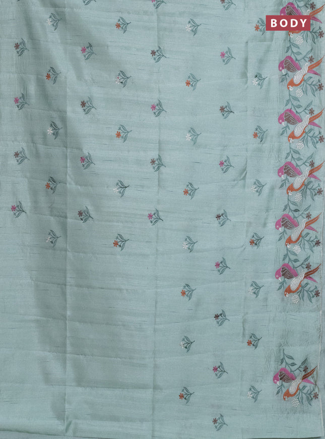 Semi raw silk saree pastel green with embroidery work buttas and parrot design embroidery butta border