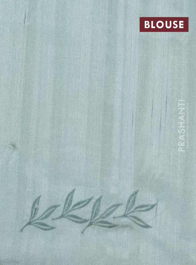 Semi raw silk saree pastel green with embroidery work buttas and parrot design embroidery butta border