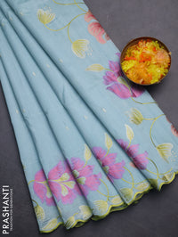Semi raw silk saree pastel blue with embroidery work buttas and floral embroidery border