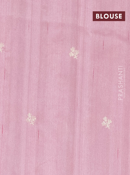 Semi raw silk saree peach shade with embroidery work buttas and floral embroidery border