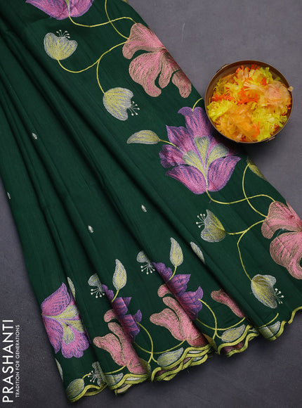 Semi raw silk saree bottle green with embroidery work buttas and floral embroidery border