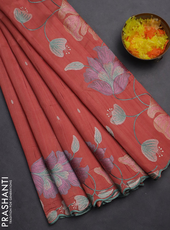 Semi raw silk saree rust shade with embroidery work buttas and floral embroidery border