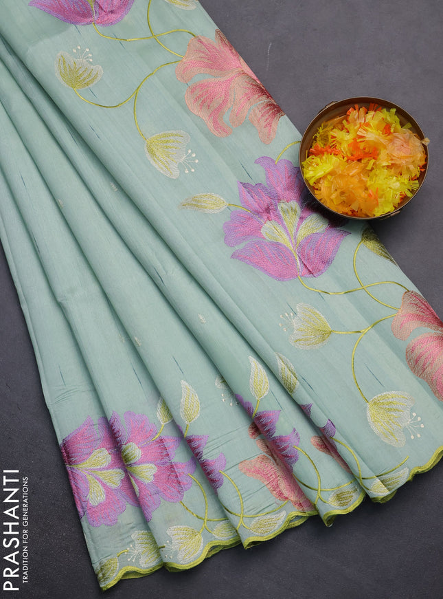 Semi raw silk saree pastel green with embroidery work buttas and floral embroidery border