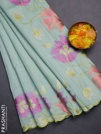 Semi raw silk saree pastel green with embroidery work buttas and floral embroidery border