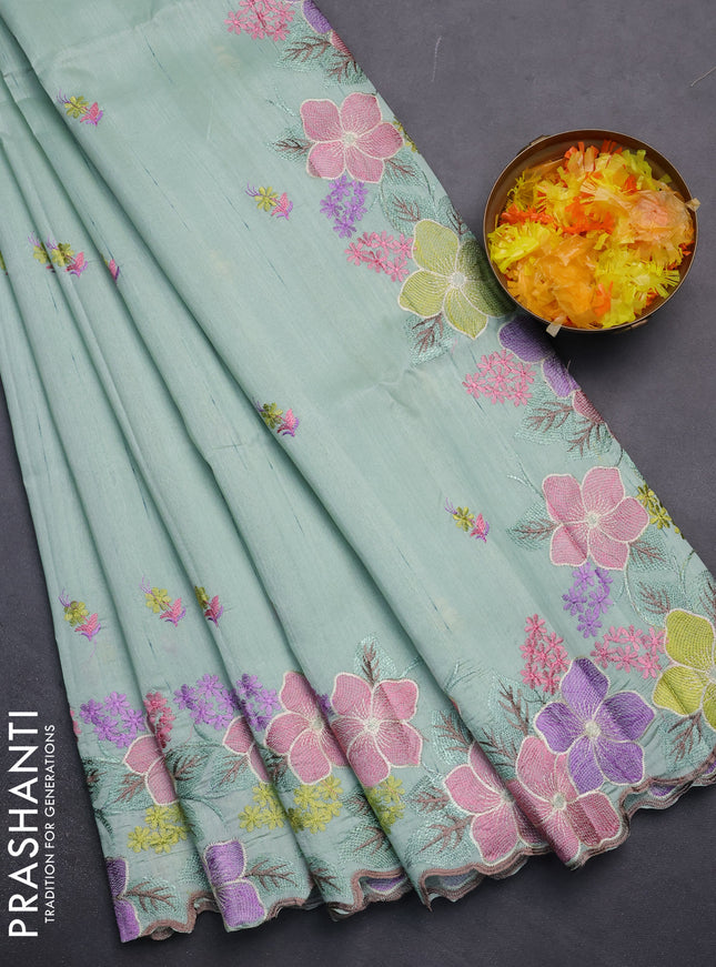 Semi raw silk saree pastel green with embroidery work buttas and floral embroidery border