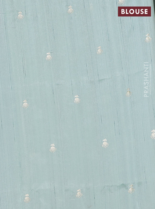 Semi raw silk saree pastel green with embroidery work buttas and floral embroidery border