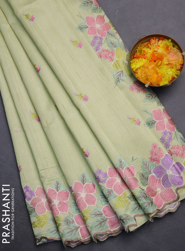 Semi raw silk saree pista green with embroidery work buttas and floral embroidery border