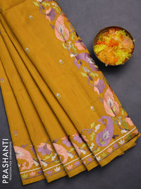 Semi raw silk saree mustard yellow with embroidery work buttas and embroidery border