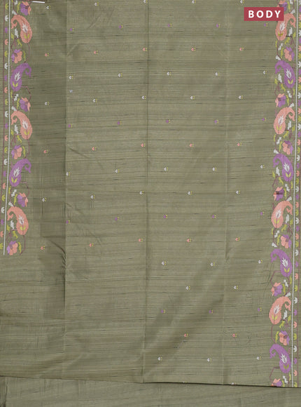 Semi raw silk saree sap green shade with embroidery work buttas and embroidery border