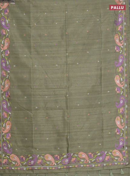Semi raw silk saree sap green shade with embroidery work buttas and embroidery border