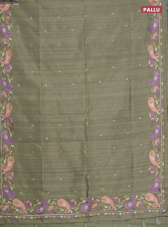 Semi raw silk saree sap green shade with embroidery work buttas and embroidery border
