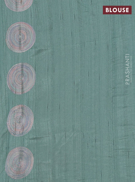 Semi raw silk saree green with embroidery work buttas and geometric embroidery butta border