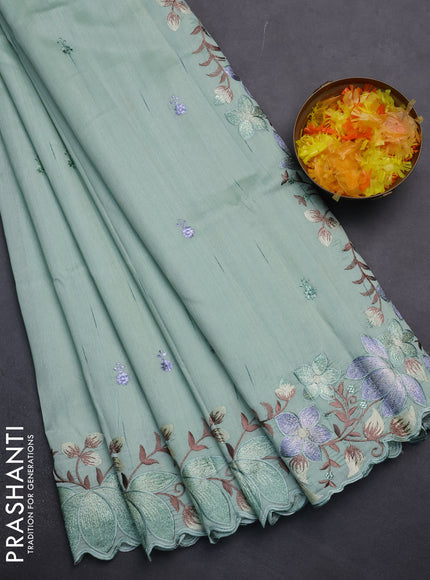 Semi raw silk saree pastel green with embroidery work buttas and embroidery border