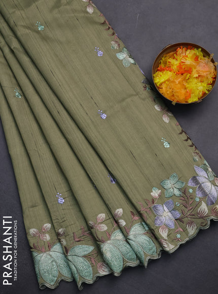 Semi raw silk saree sap green with embroidery work buttas and embroidery border