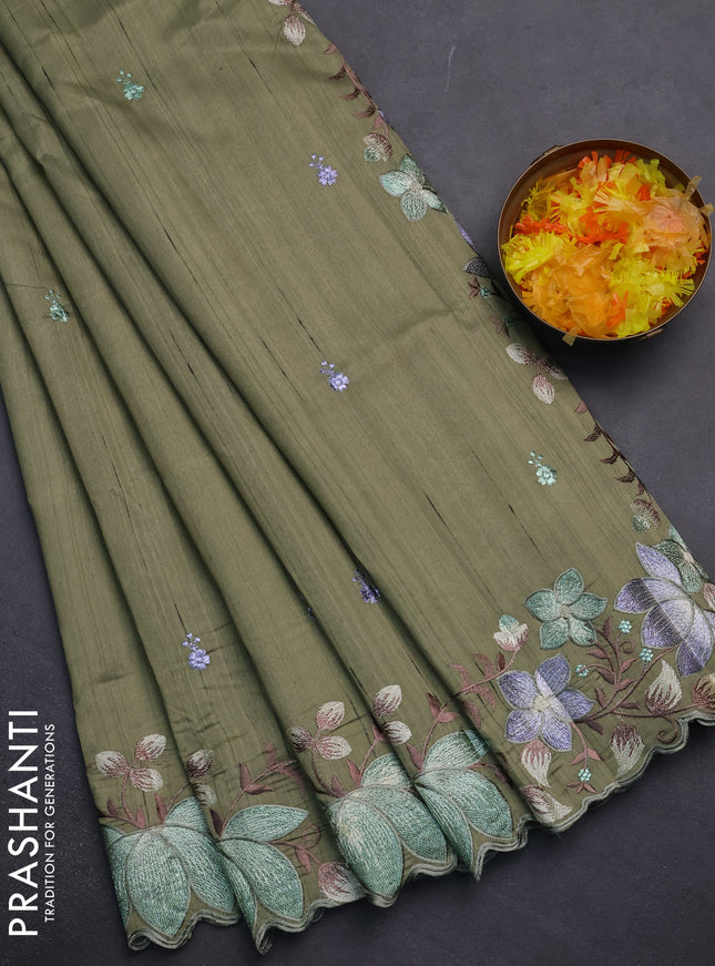 Semi raw silk saree sap green with embroidery work buttas and embroidery border