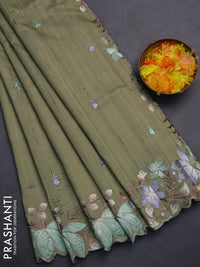 Semi raw silk saree sap green with embroidery work buttas and embroidery border