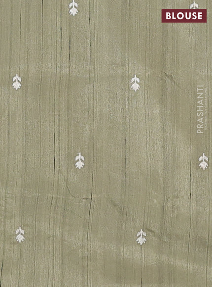 Semi raw silk saree sap green with embroidery work buttas and embroidery border