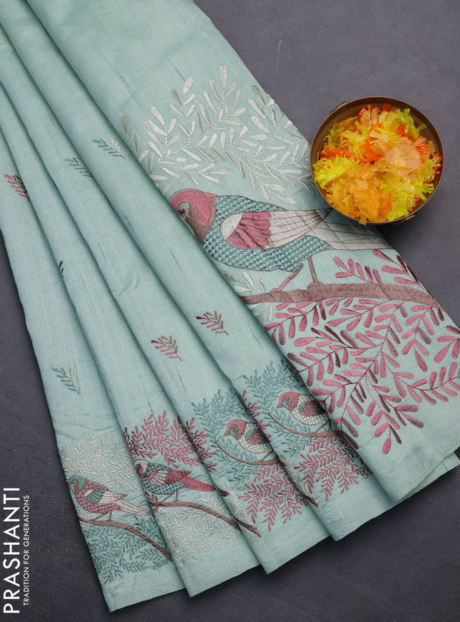 Semi raw silk saree pastel green with embroidery work buttas and embroidery border