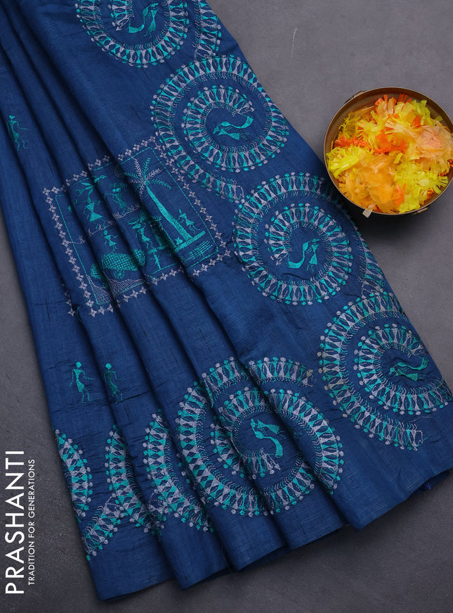 Semi raw silk saree dark peacock blue with embroidery work buttas and warli design embroidery border