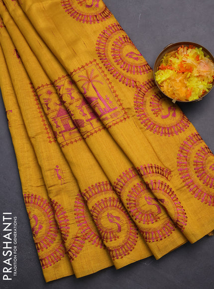 Semi raw silk saree mustard yellow with embroidery work buttas and warli design embroidery border