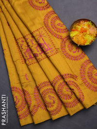 Semi raw silk saree mustard yellow with embroidery work buttas and warli design embroidery border