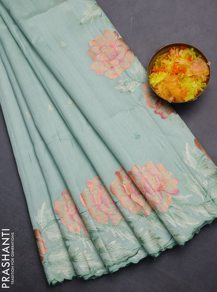 Semi raw silk saree pastel green with embroidery work buttas and floral embroidery border