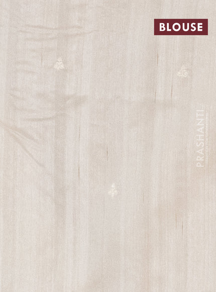 Semi raw silk saree cream with embroidery work buttas and floral embroidery border