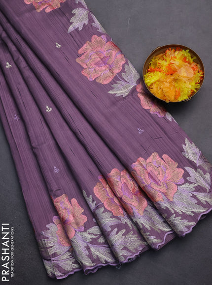 Semi raw silk saree purple shade with embroidery work buttas and floral embroidery border