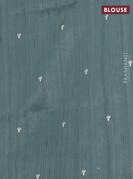 Semi raw silk saree greyish green with embroidery work buttas and floral embroidery border