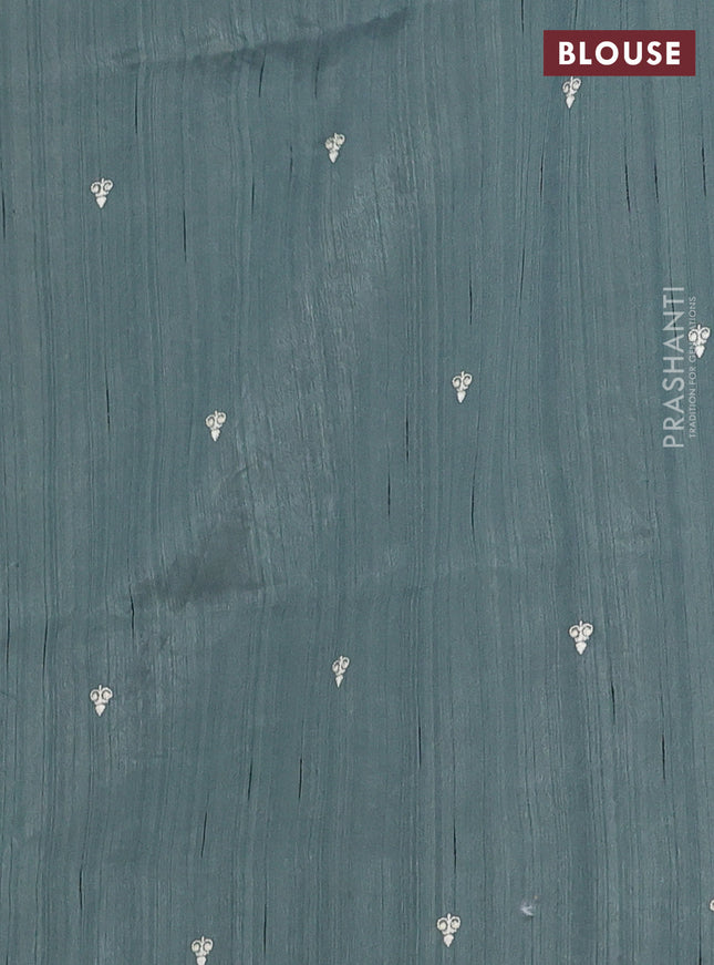 Semi raw silk saree greyish green with embroidery work buttas and floral embroidery border