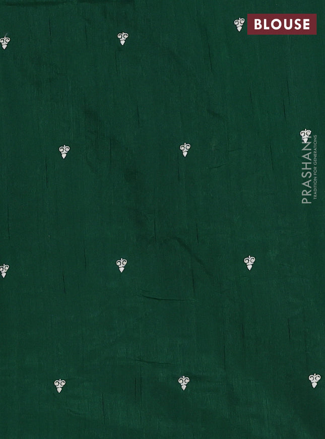 Semi raw silk saree dark green with embroidery work buttas and floral embroidery border