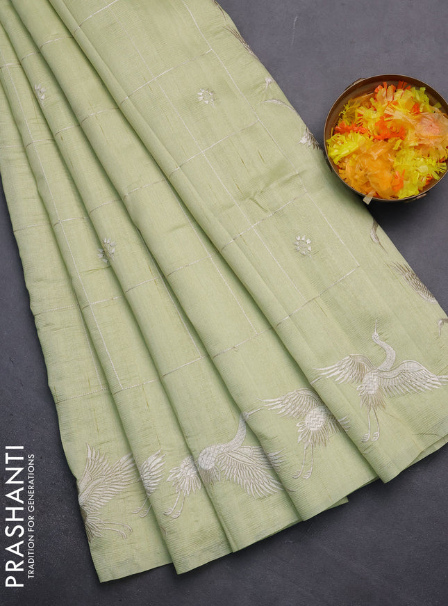 Semi raw silk saree pista green with allover checked embroidery work and embroidery border