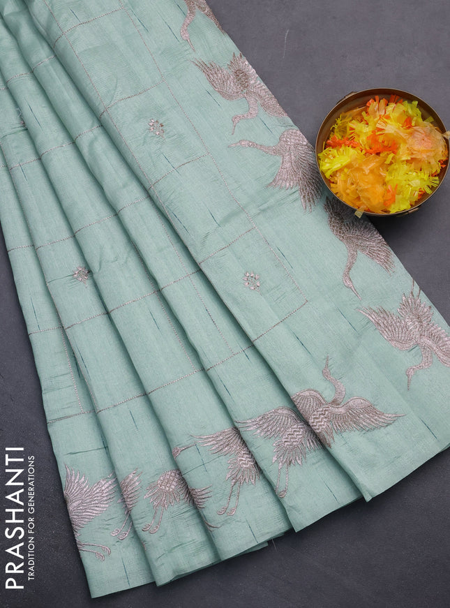 Semi raw silk saree pastel green with allover checked embroidery work and embroidery border