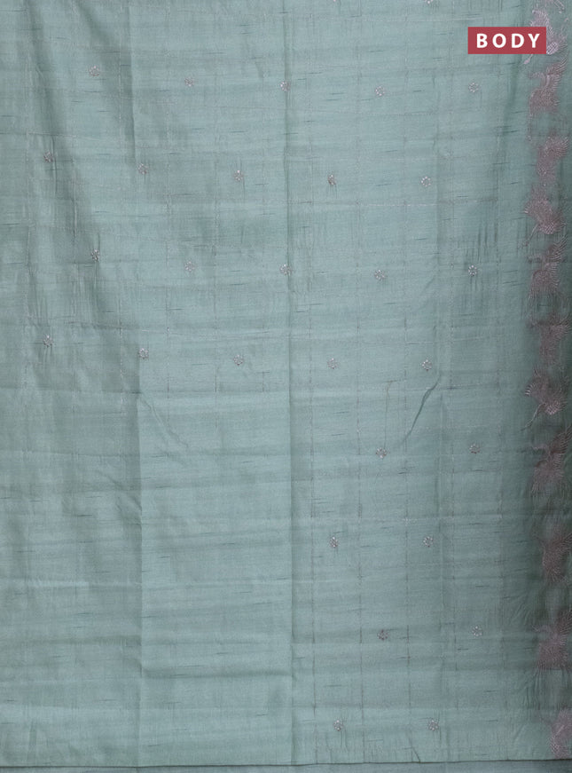 Semi raw silk saree pastel green with allover checked embroidery work and embroidery border