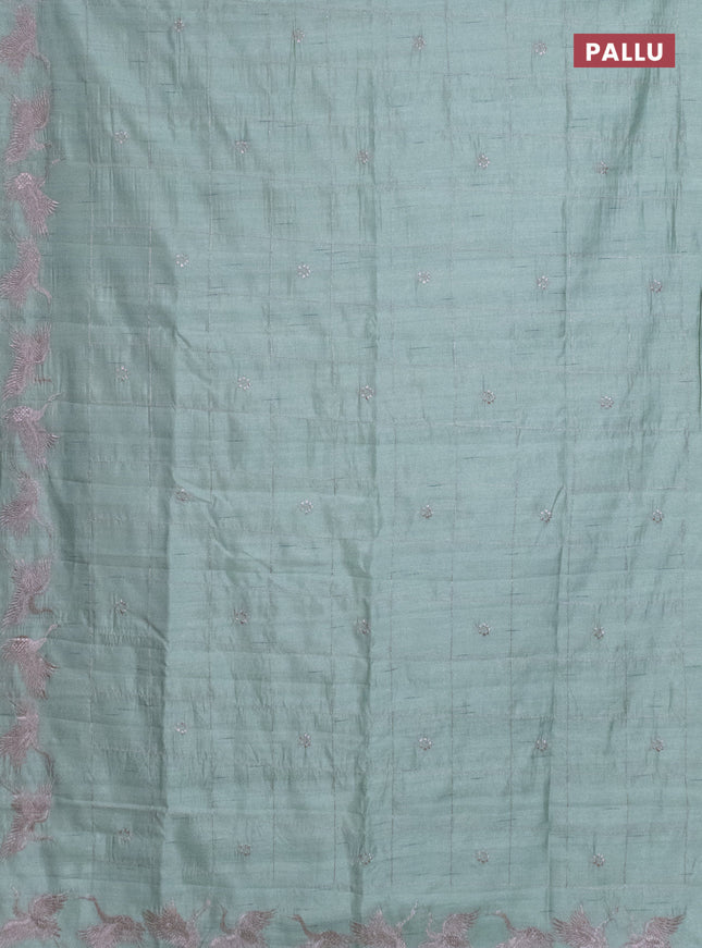Semi raw silk saree pastel green with allover checked embroidery work and embroidery border