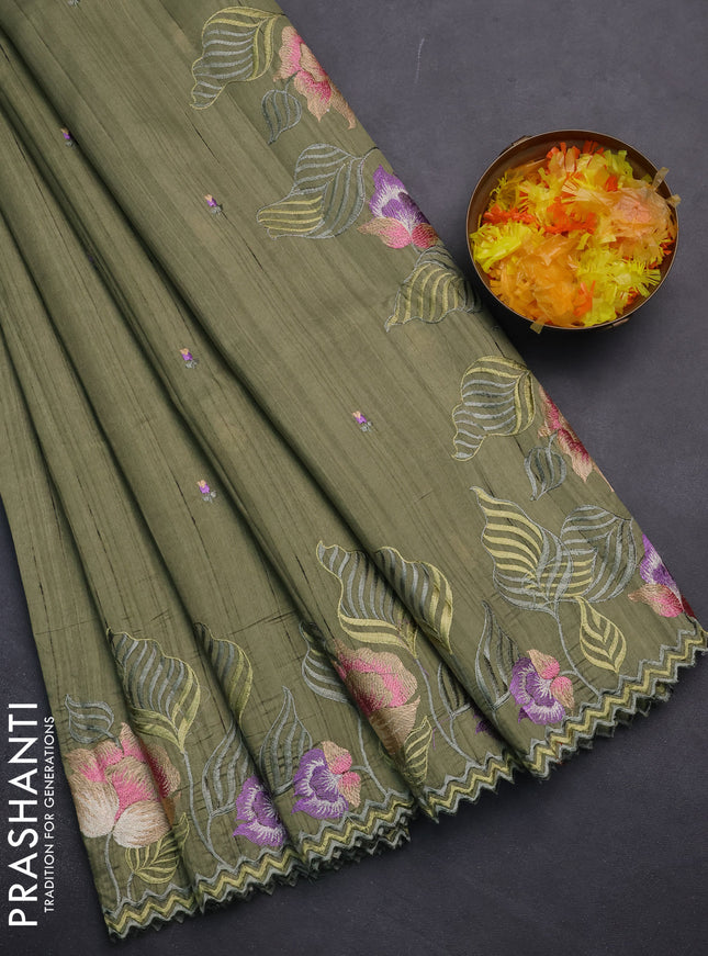 Semi raw silk saree sap green with embroidery work buttas and floral embroidery border