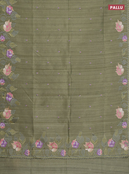 Semi raw silk saree sap green with embroidery work buttas and floral embroidery border