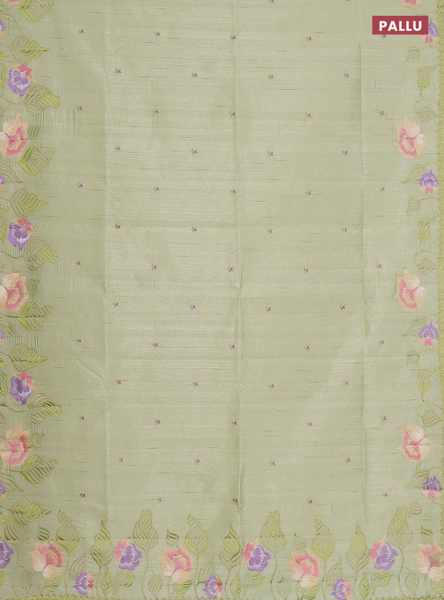 Semi raw silk saree pista green with embroidery work buttas and floral embroidery border