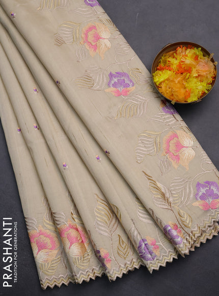 Semi raw silk saree cream with embroidery work buttas and floral embroidery border