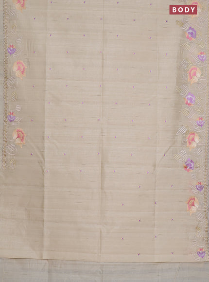 Semi raw silk saree cream with embroidery work buttas and floral embroidery border