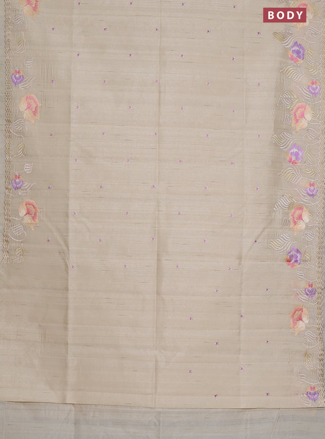 Semi raw silk saree cream with embroidery work buttas and floral embroidery border