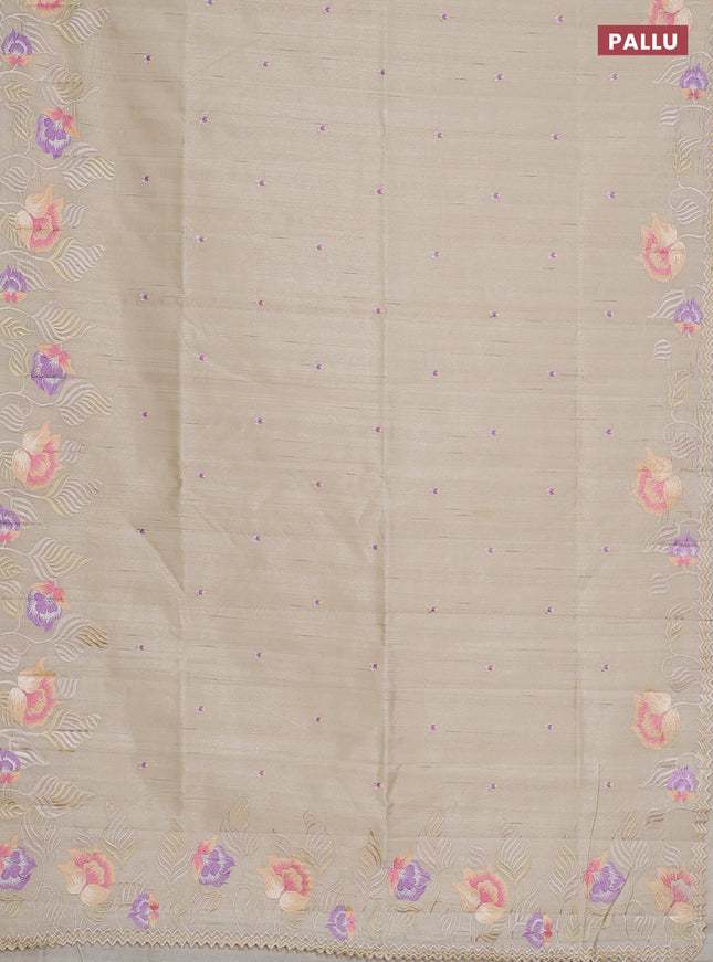 Semi raw silk saree cream with embroidery work buttas and floral embroidery border