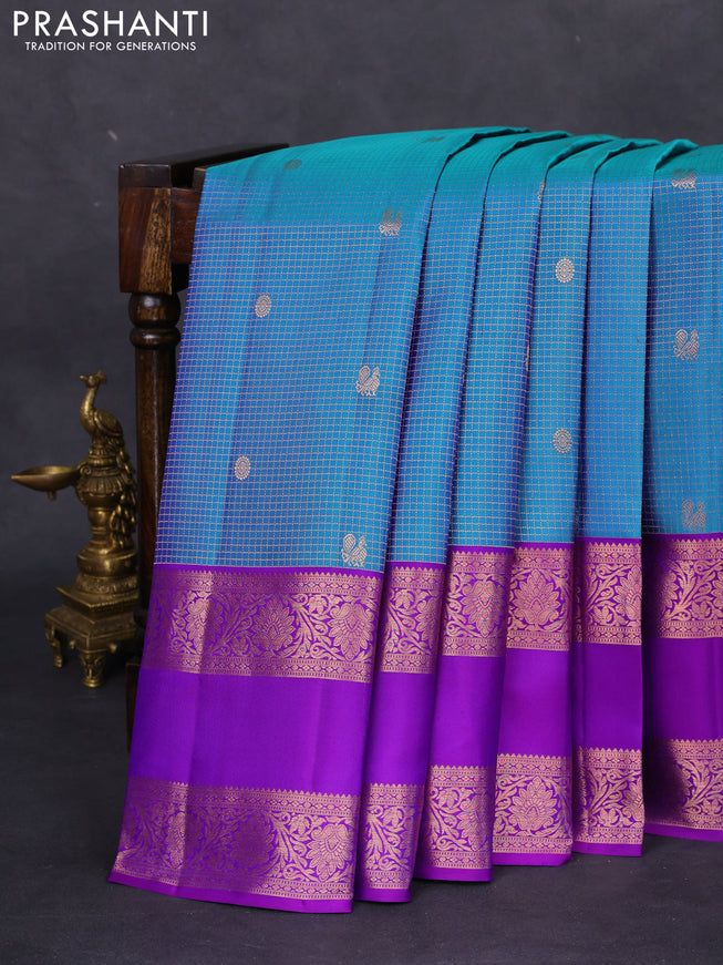 Pure kanchipuram silk saree dual shade of blue and purple with allover zari woven brocade weaves and rettapet copper zari woven border