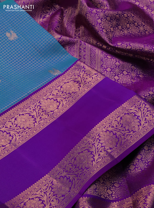 Pure kanchipuram silk saree dual shade of blue and purple with allover zari woven brocade weaves and rettapet copper zari woven border